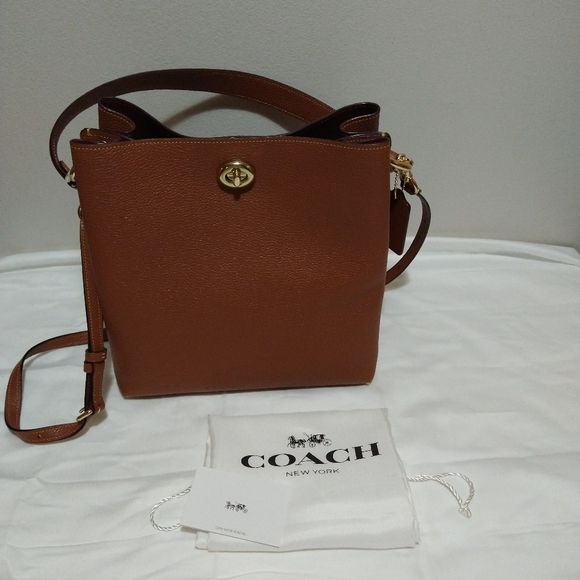 Coach Handbags - Coach Saddle Charlie Pebble Leather Bucket Bag